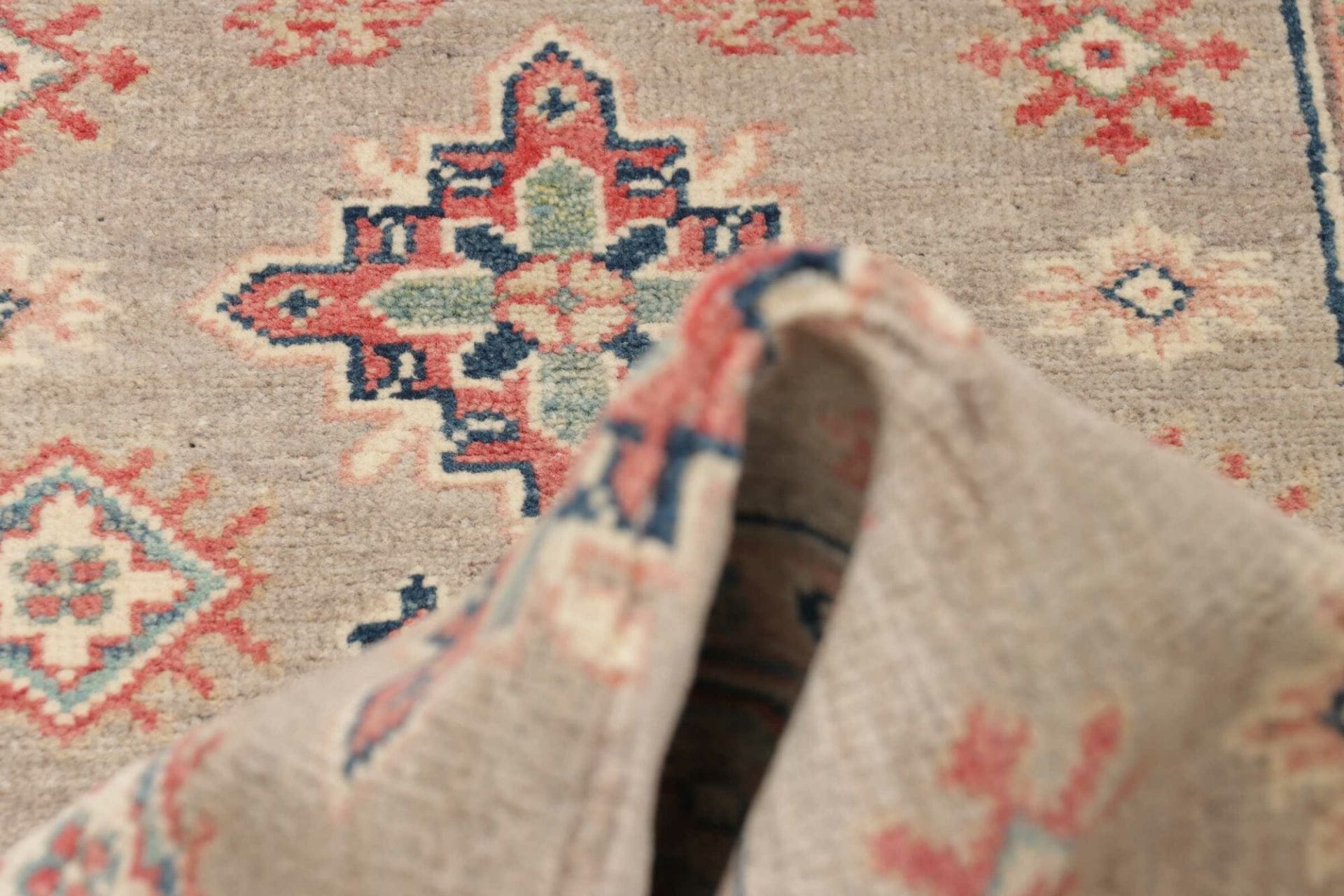 Kazak Orientteppich 82 × 125 cm aus Wolle, handgeknüpft