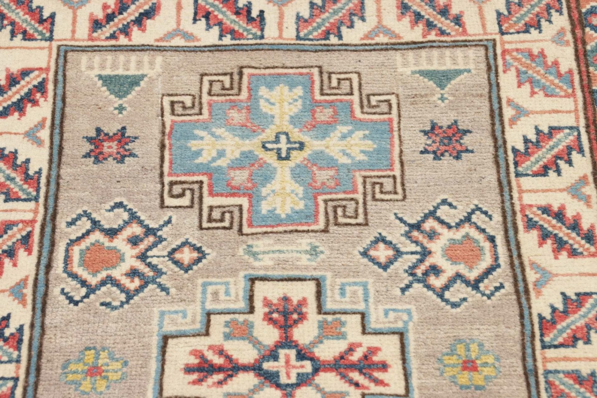 Kazak Orientteppich 64 × 91 cm aus Wolle, handgeknüpft