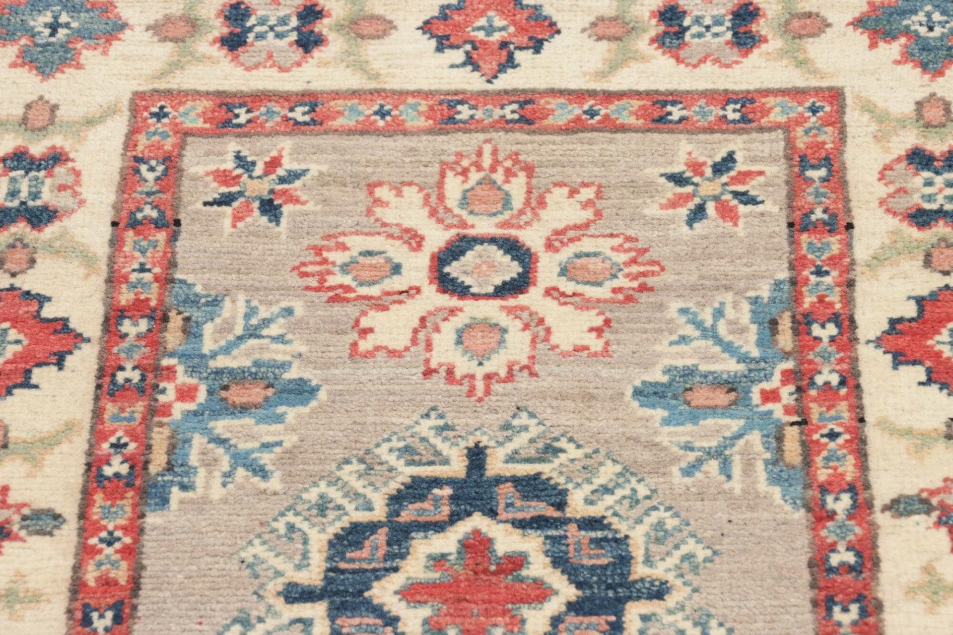 Kazak Orientteppich 65 × 90 cm aus Wolle, handgeknüpft