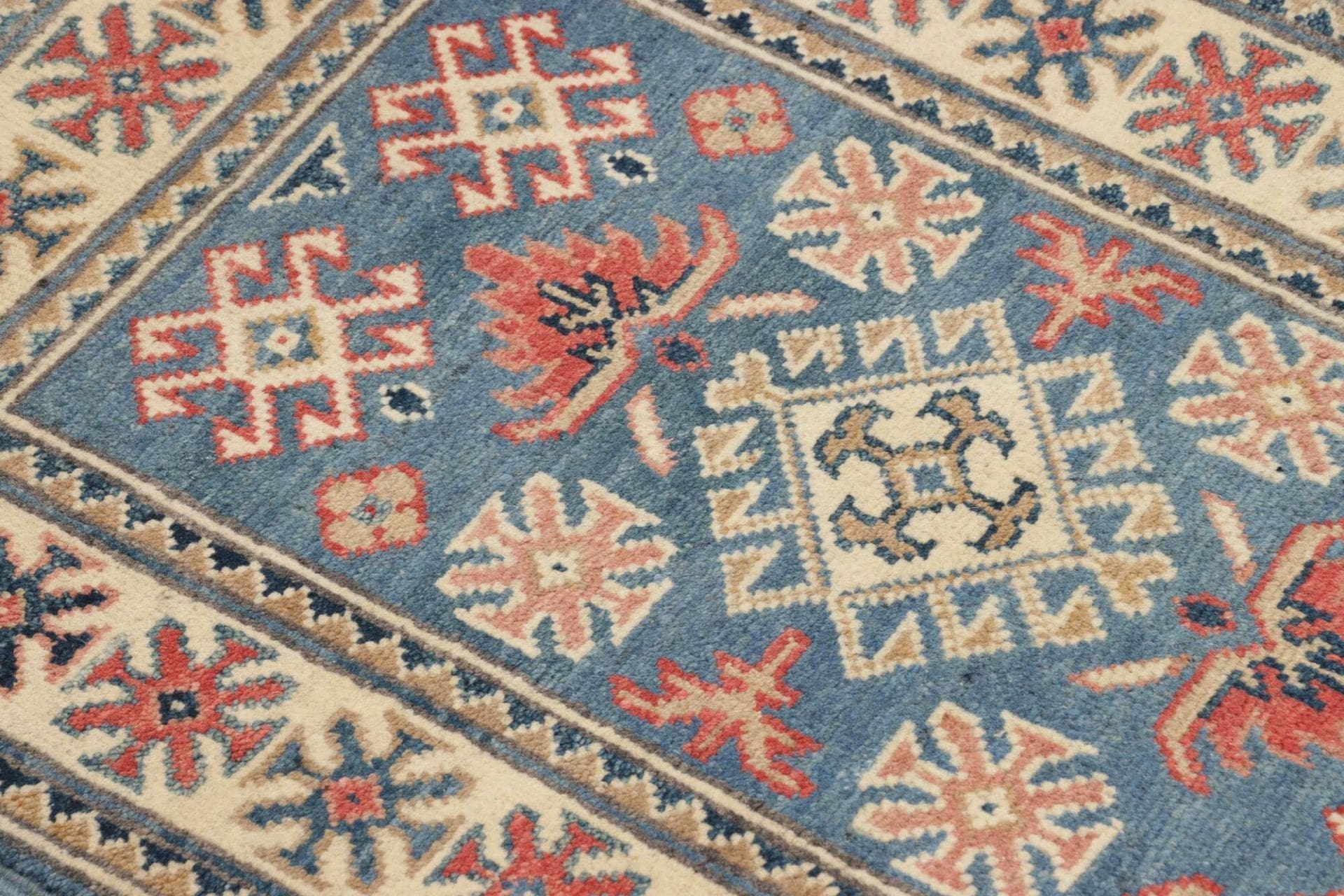 Kazak Orientteppich aus Pakistan, 64 × 89 cm