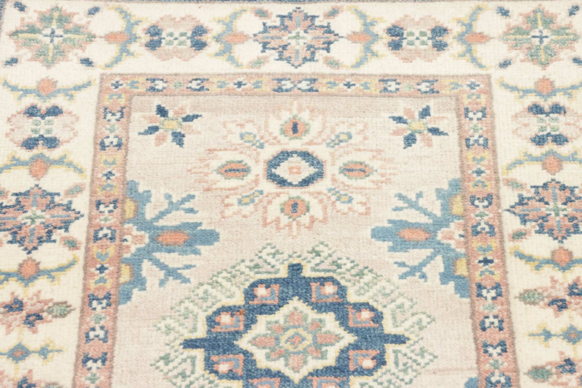 Kazak Orientteppich 63 × 85 cm aus Wolle, handgeknüpft