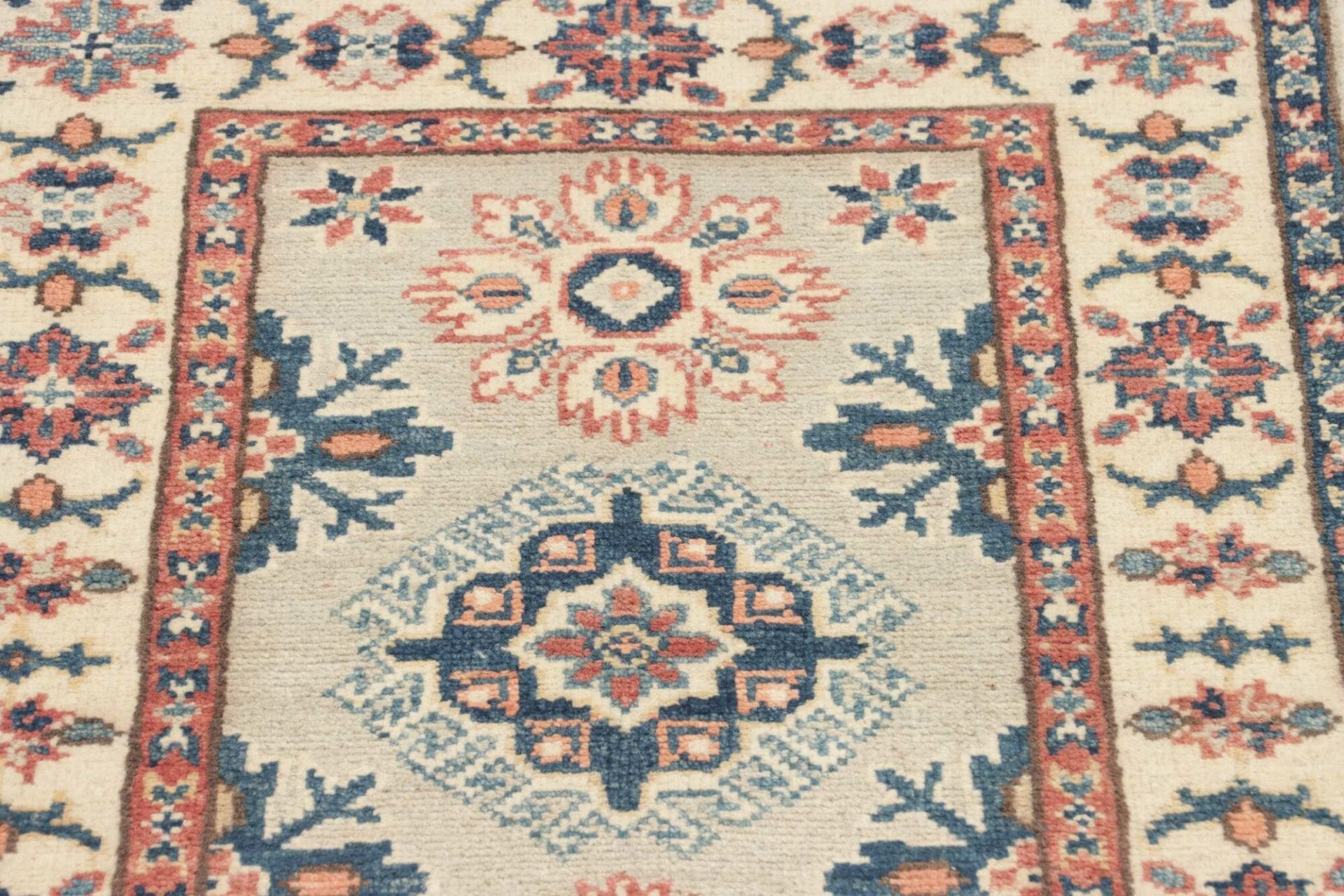 Kazak Orientteppich 64 × 85 cm aus Wolle, handgeknüpft