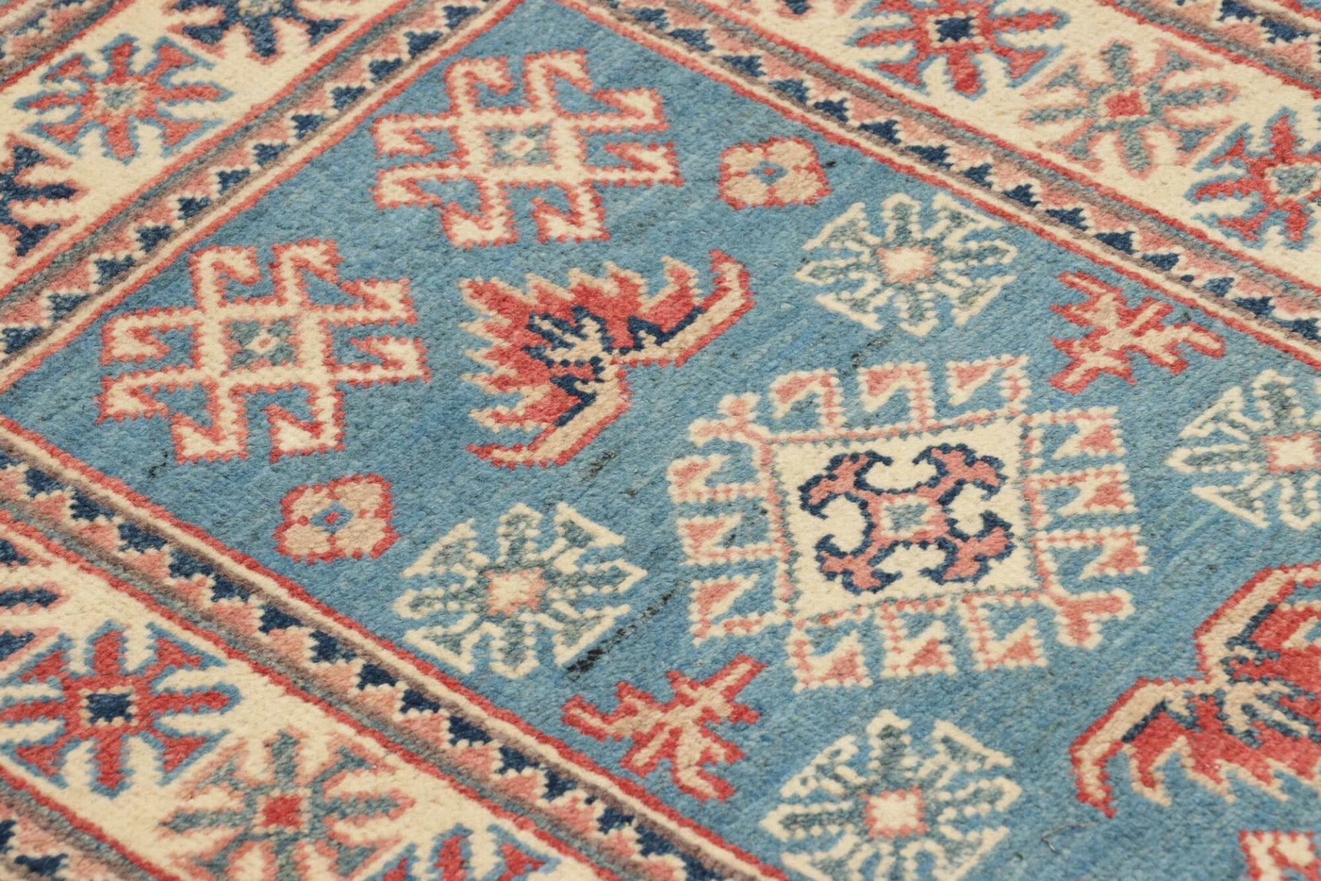 Kazak Orientteppich 65 × 85 cm aus Wolle, handgeknüpft