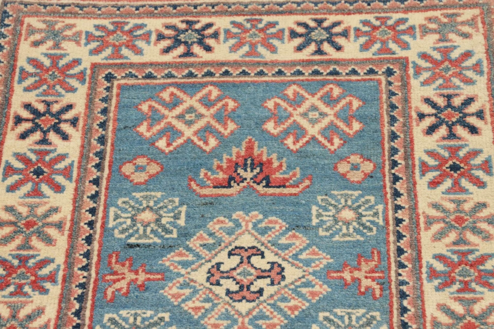 Kazak Orientteppich 65 × 85 cm aus Wolle, handgeknüpft