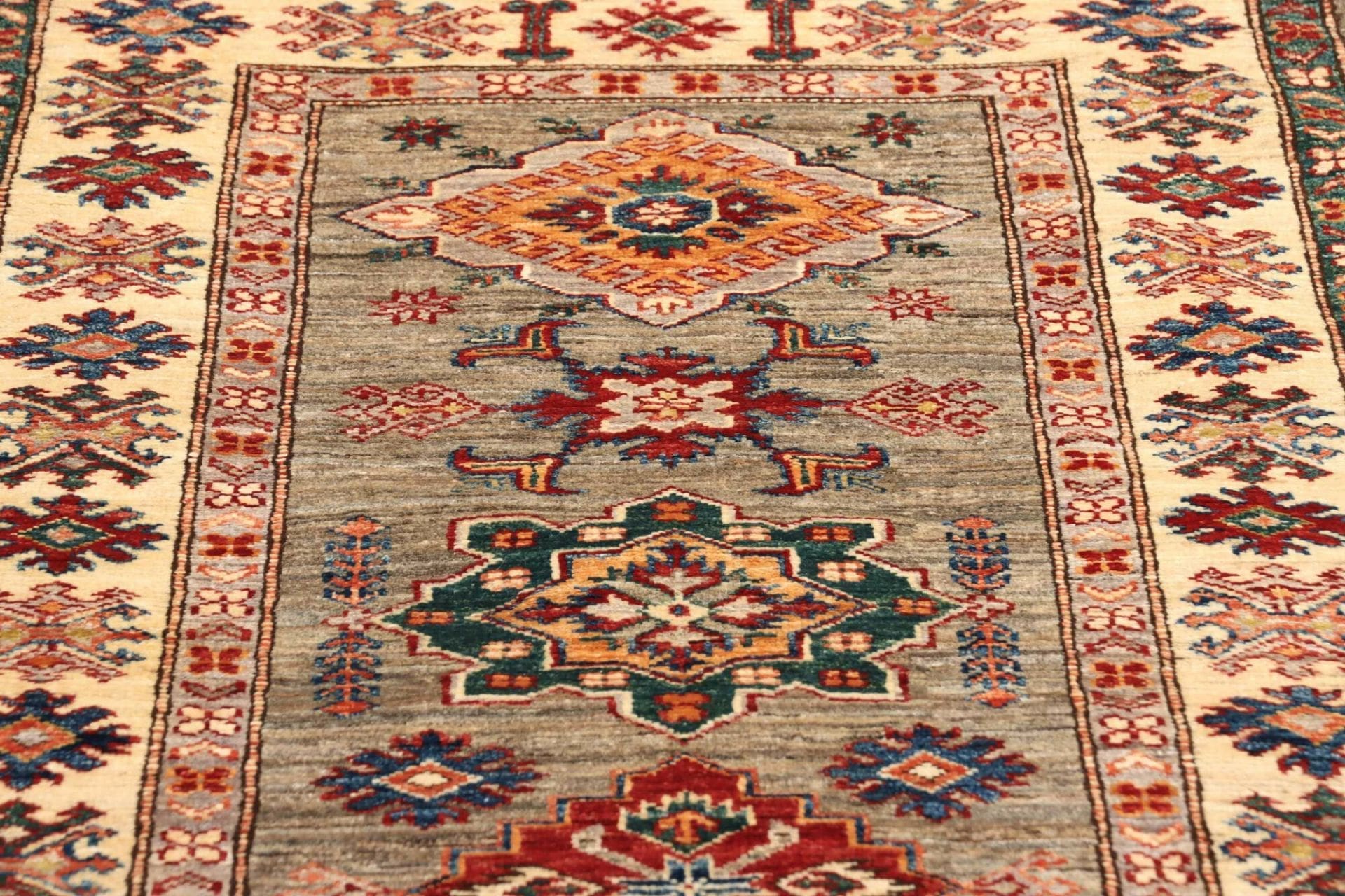 Kazak Orientteppich 85 × 258 cm aus Wolle, handgeknüpft