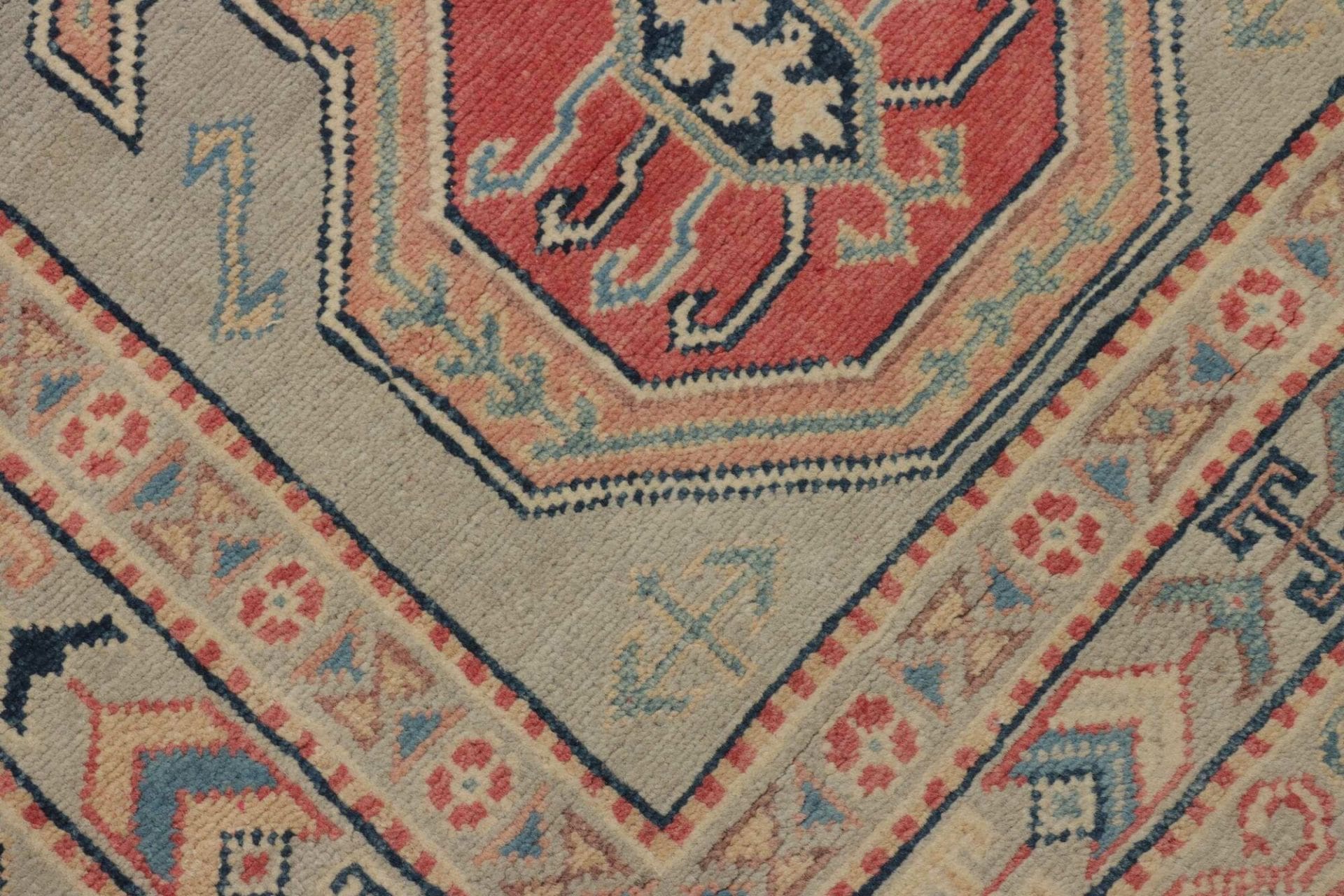Kazak Orientteppich 85 × 286 cm aus Wolle, handgeknüpft