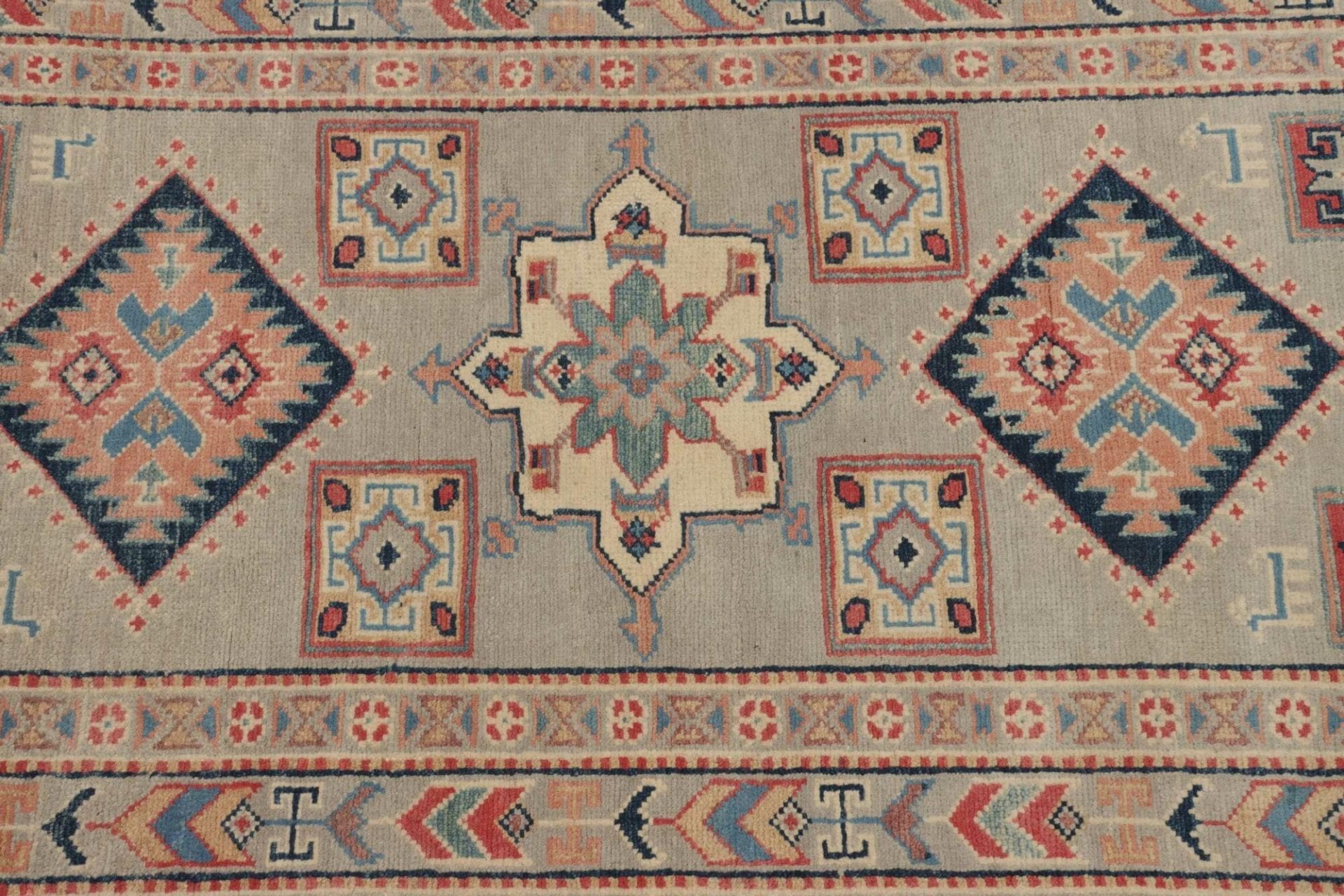 Kazak Orientteppich 85 × 286 cm aus Wolle, handgeknüpft