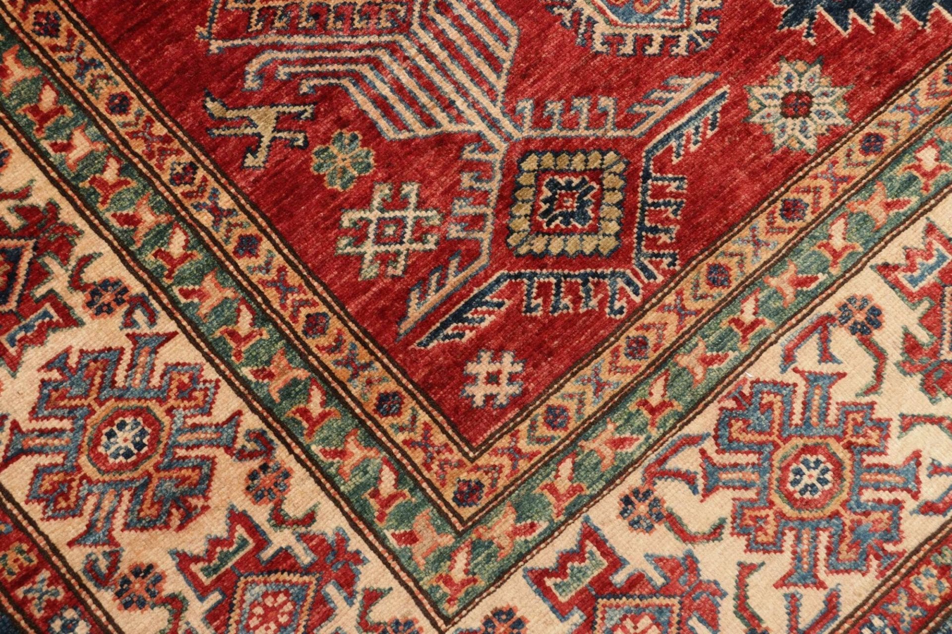 Kazak Orientteppich 185 × 253 cm aus Wolle, handgeknüpft