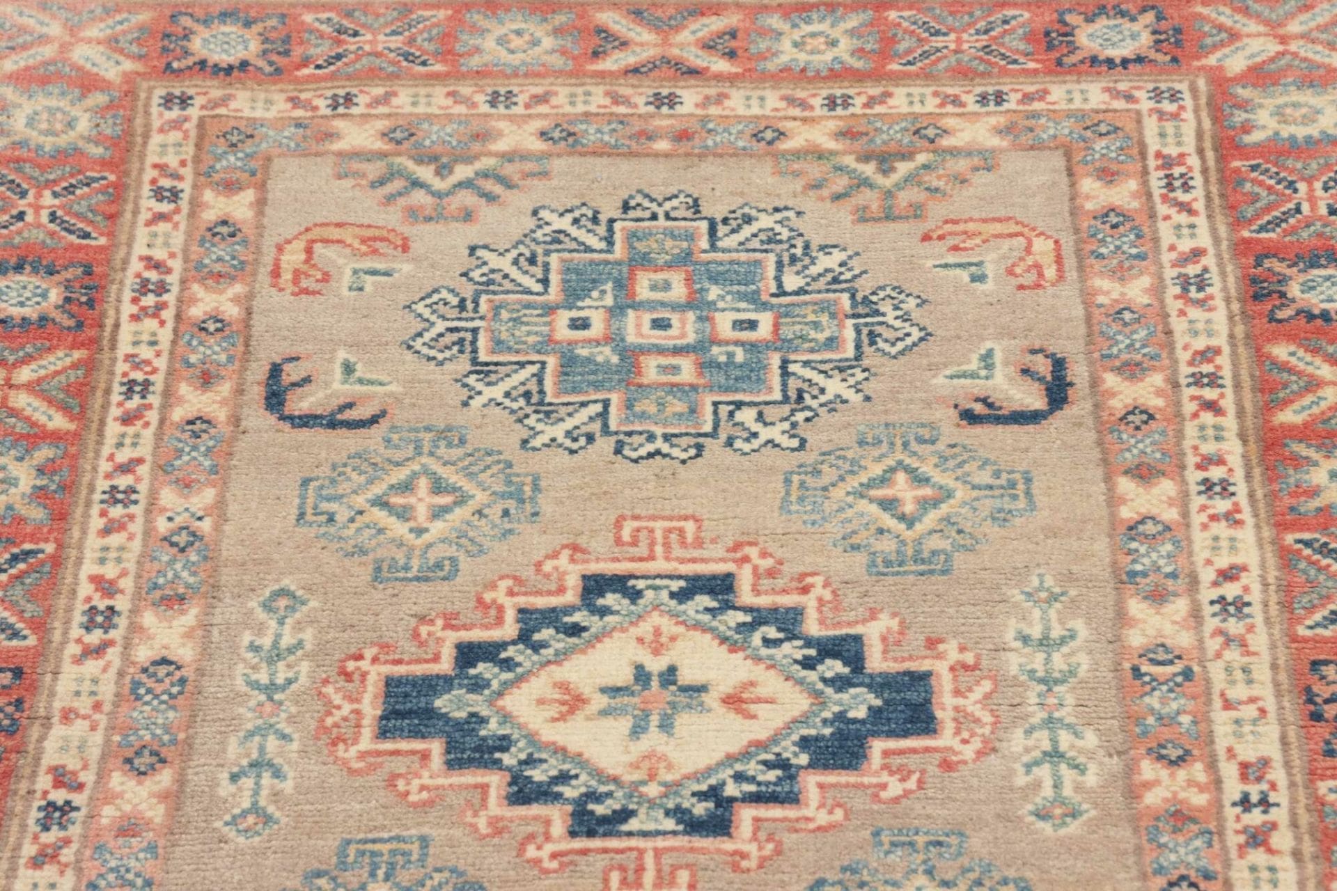 Kazak Orientteppich aus Pakistan, 85 × 116 cm