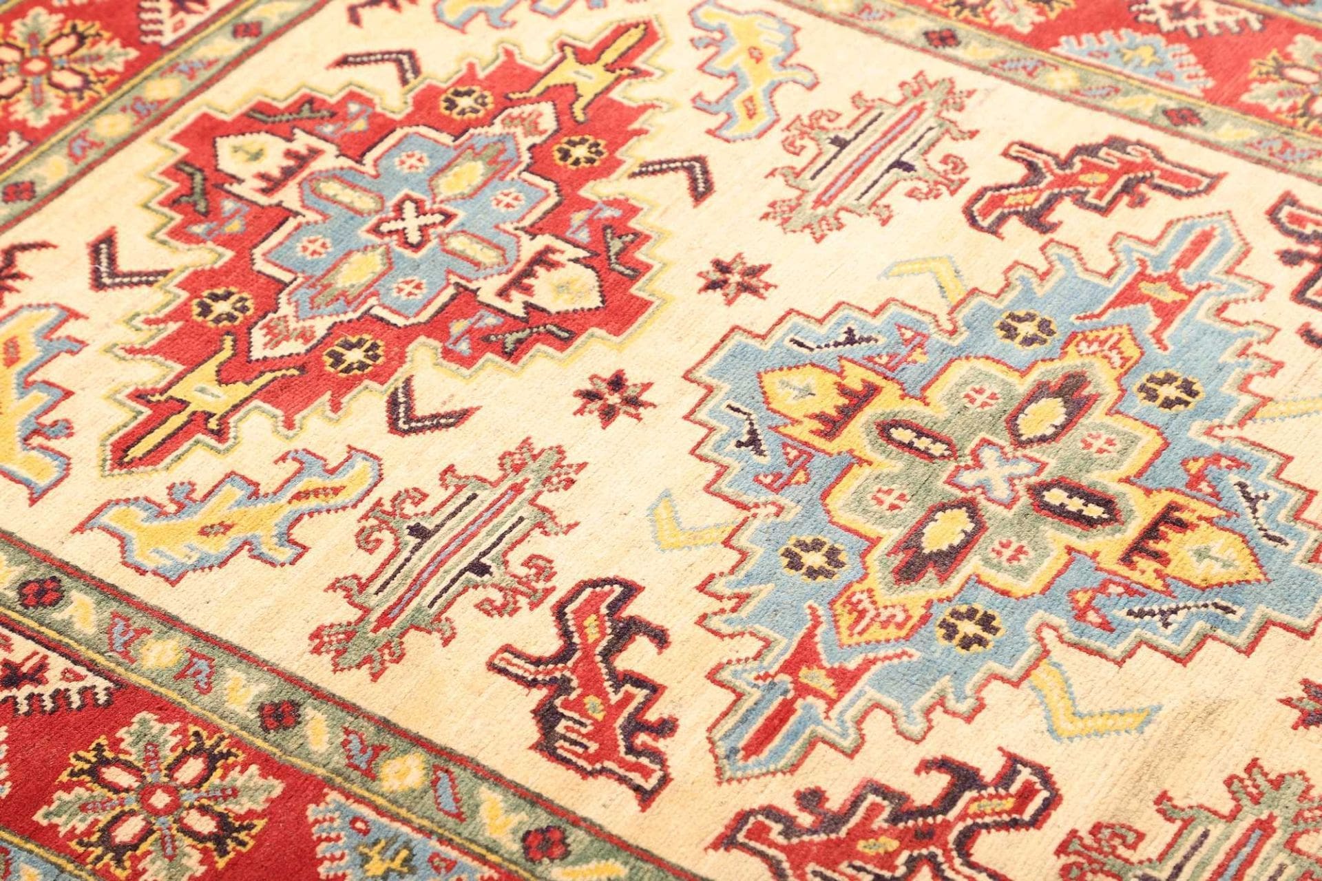 kazak-teppich-121-x-192-cm-geometrische-muster-handgeknupft-6 Kazak Orientteppich aus Pakistan, 121 × 192 cm