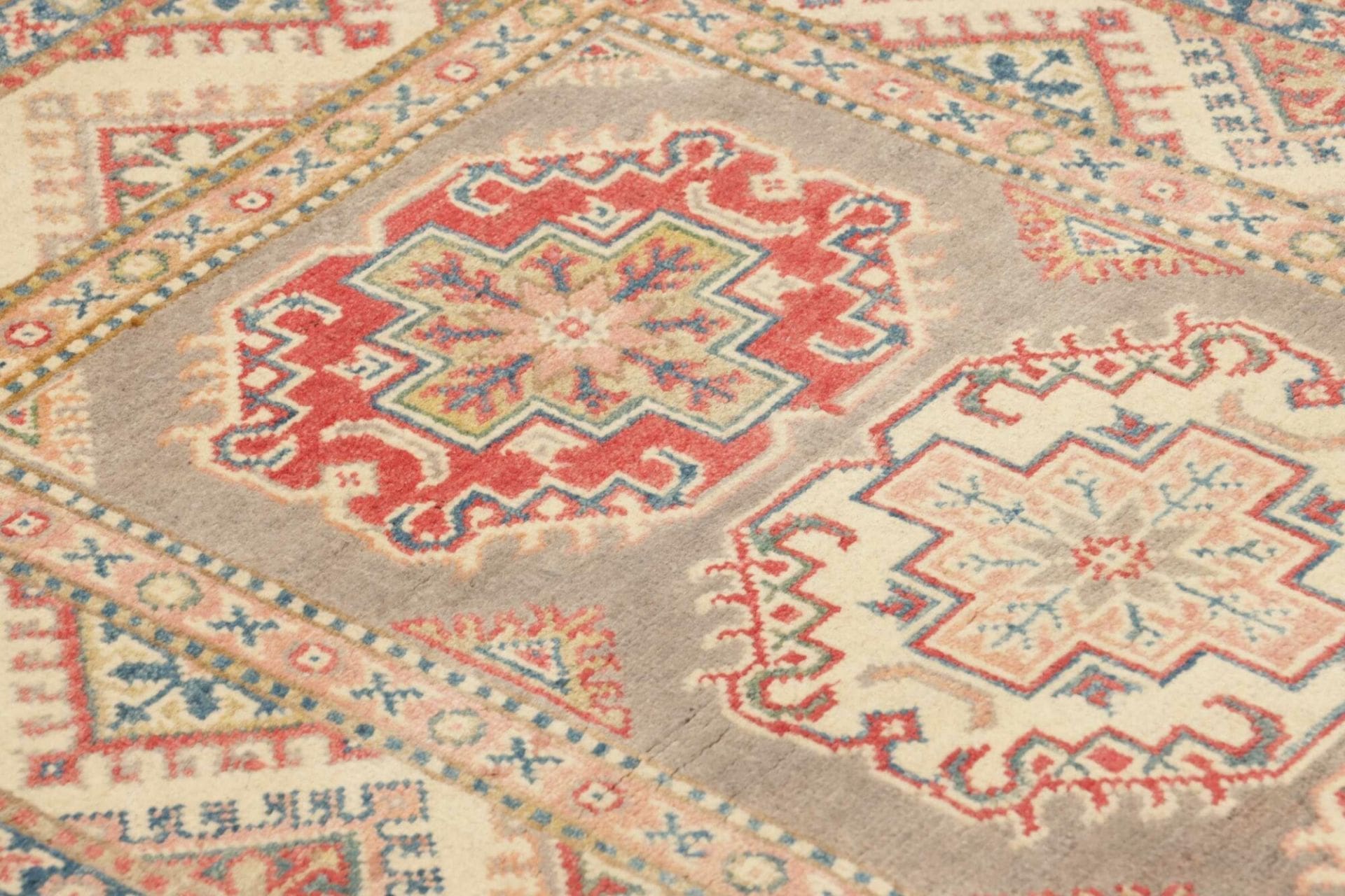 Kazak Orientteppich aus Pakistan, 84 × 126 cm