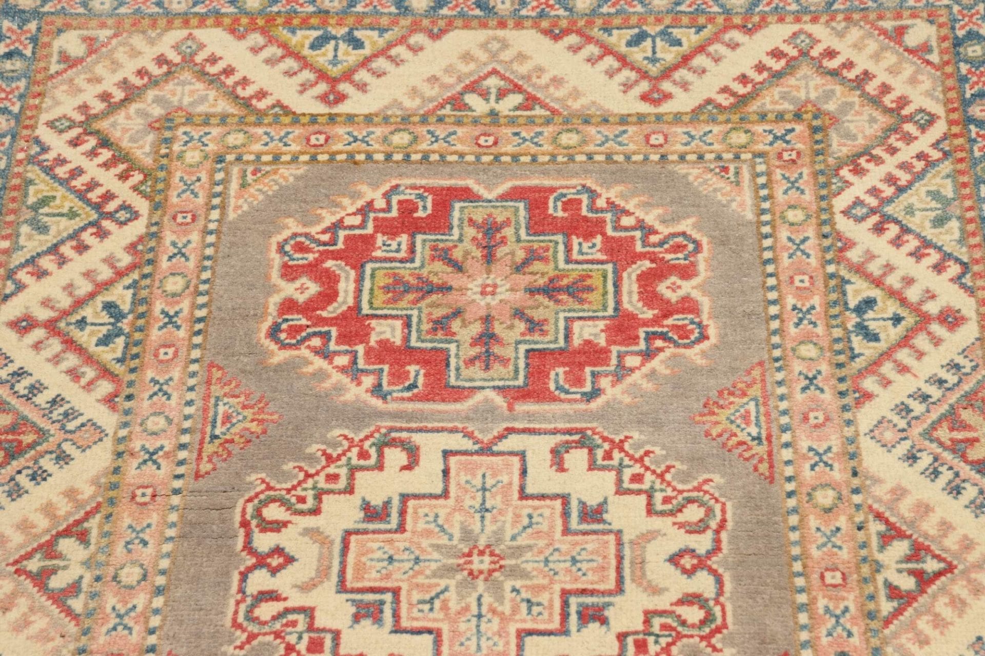 Kazak Orientteppich aus Pakistan, 84 × 126 cm