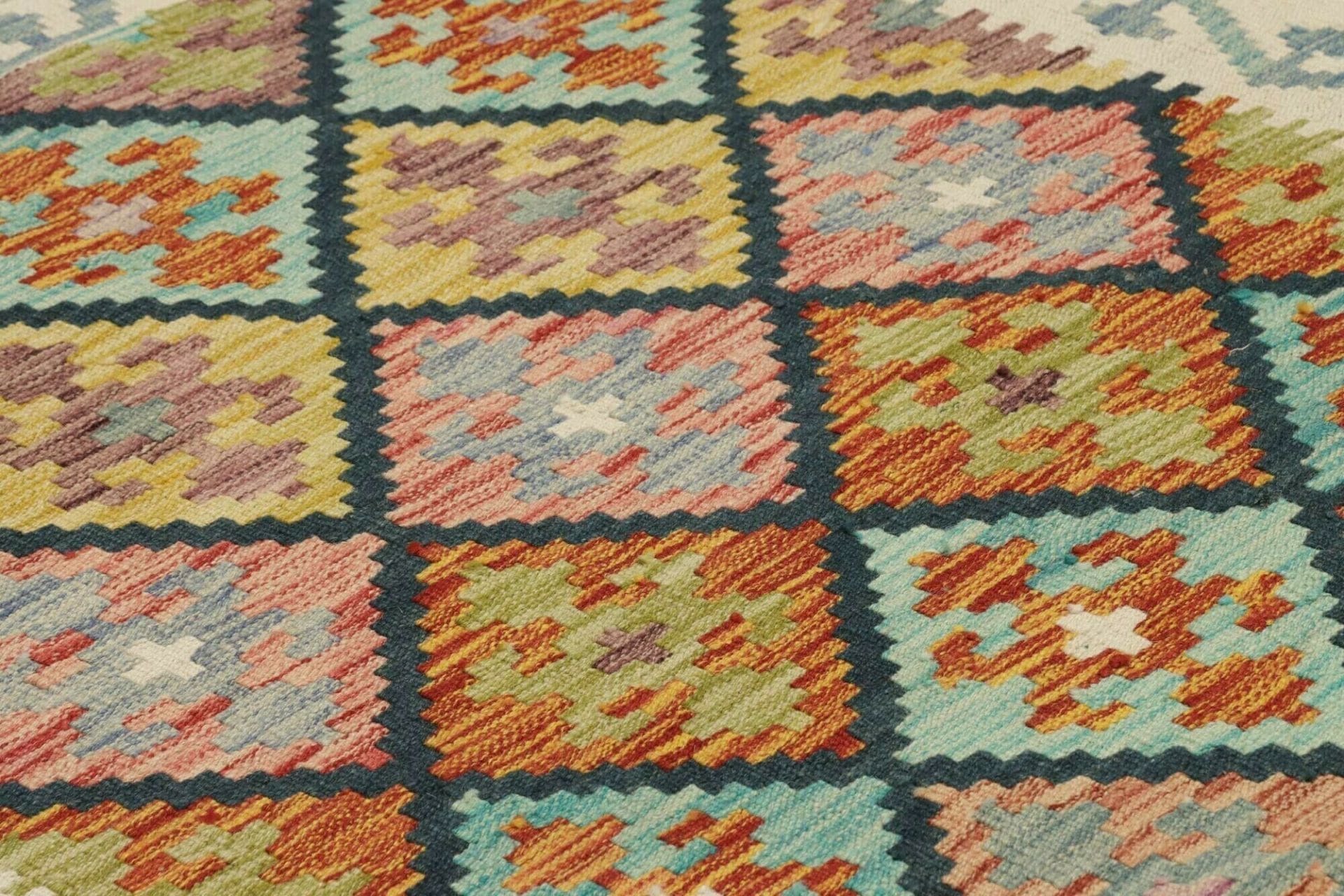 kelim-teppich-102-x-200-cm-aus-schurwolle-handgewebt-orientalisch-4 Handgewebter Kelim, 102 × 200 cm, Wolle