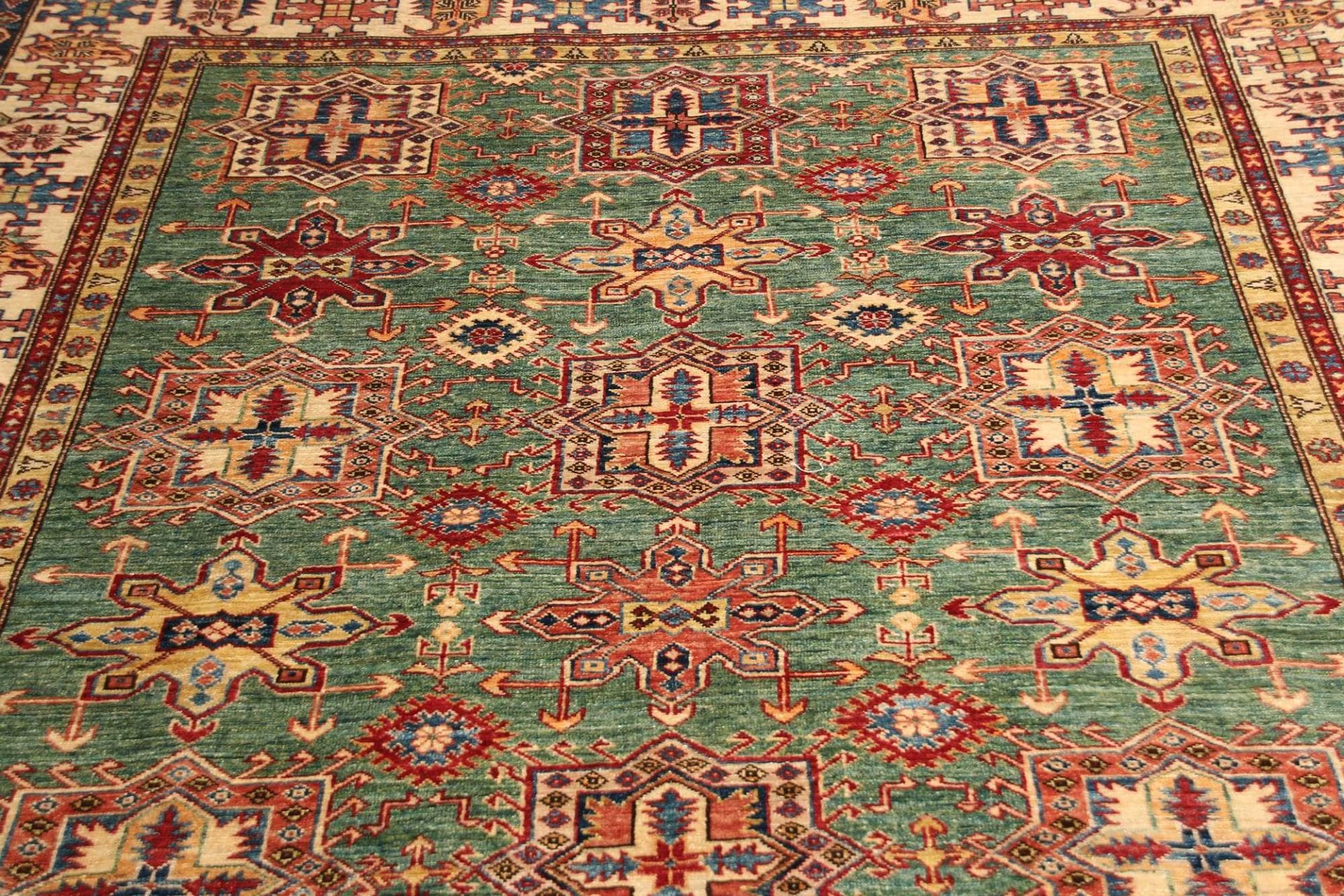 Kazak Orientteppich 210 × 306 cm aus Wolle, handgeknüpft