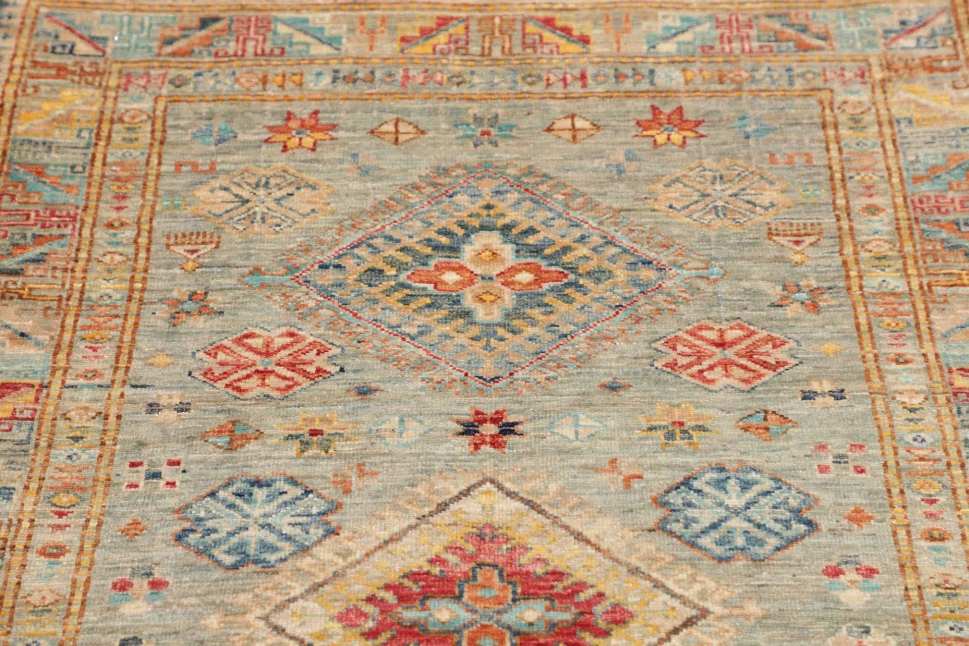 kazak-teppich-99-x-153cm-geometrisches-muster-handgeknupft-7 Kazak Orientteppich 99 × 153 cm aus Wolle, handgeknüpft