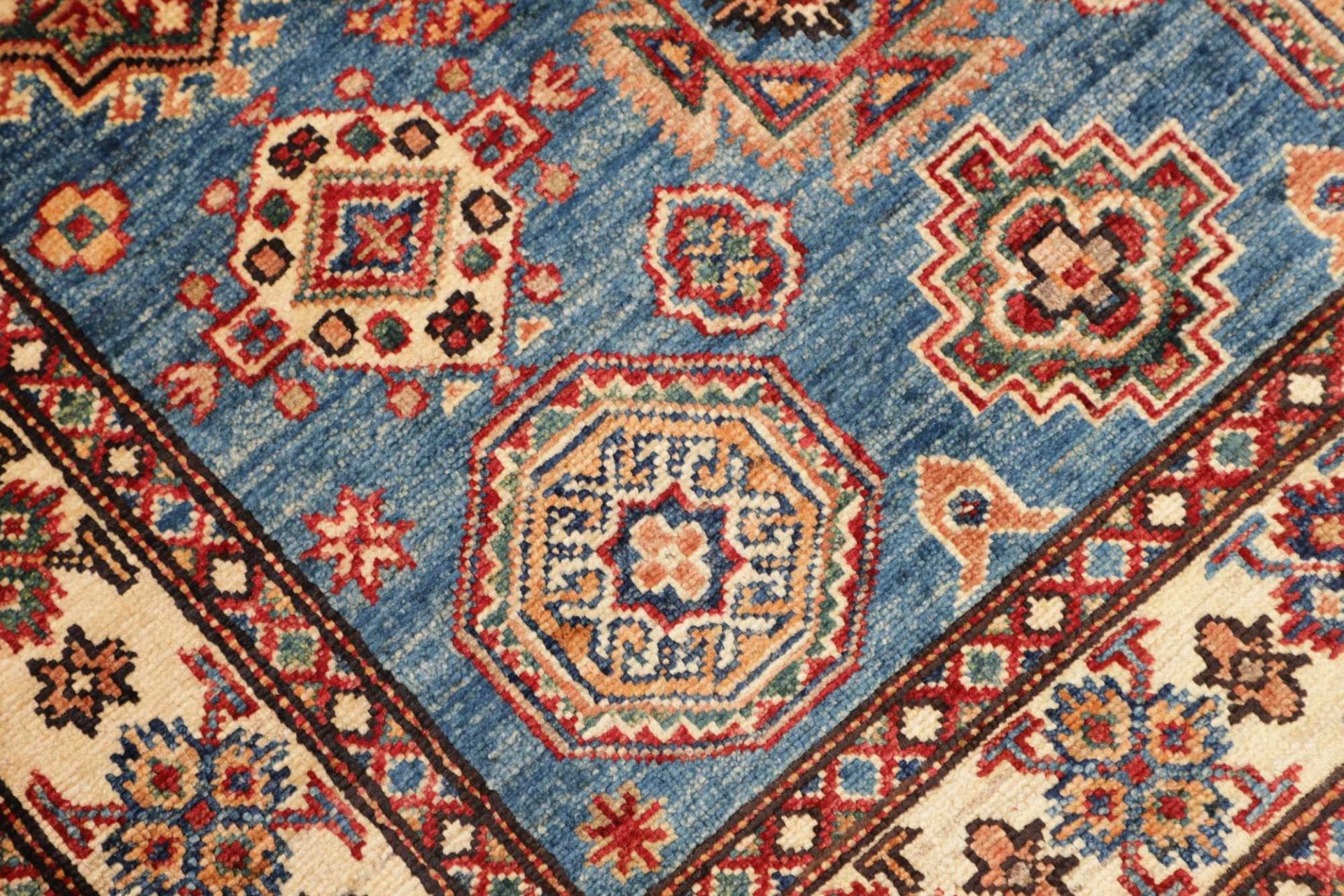 kazak-teppich-101-x-147-cm-geometrisches-muster-handgeknupft-5 Kazak Orientteppich 101 × 147 cm aus Wolle, handgeknüpft