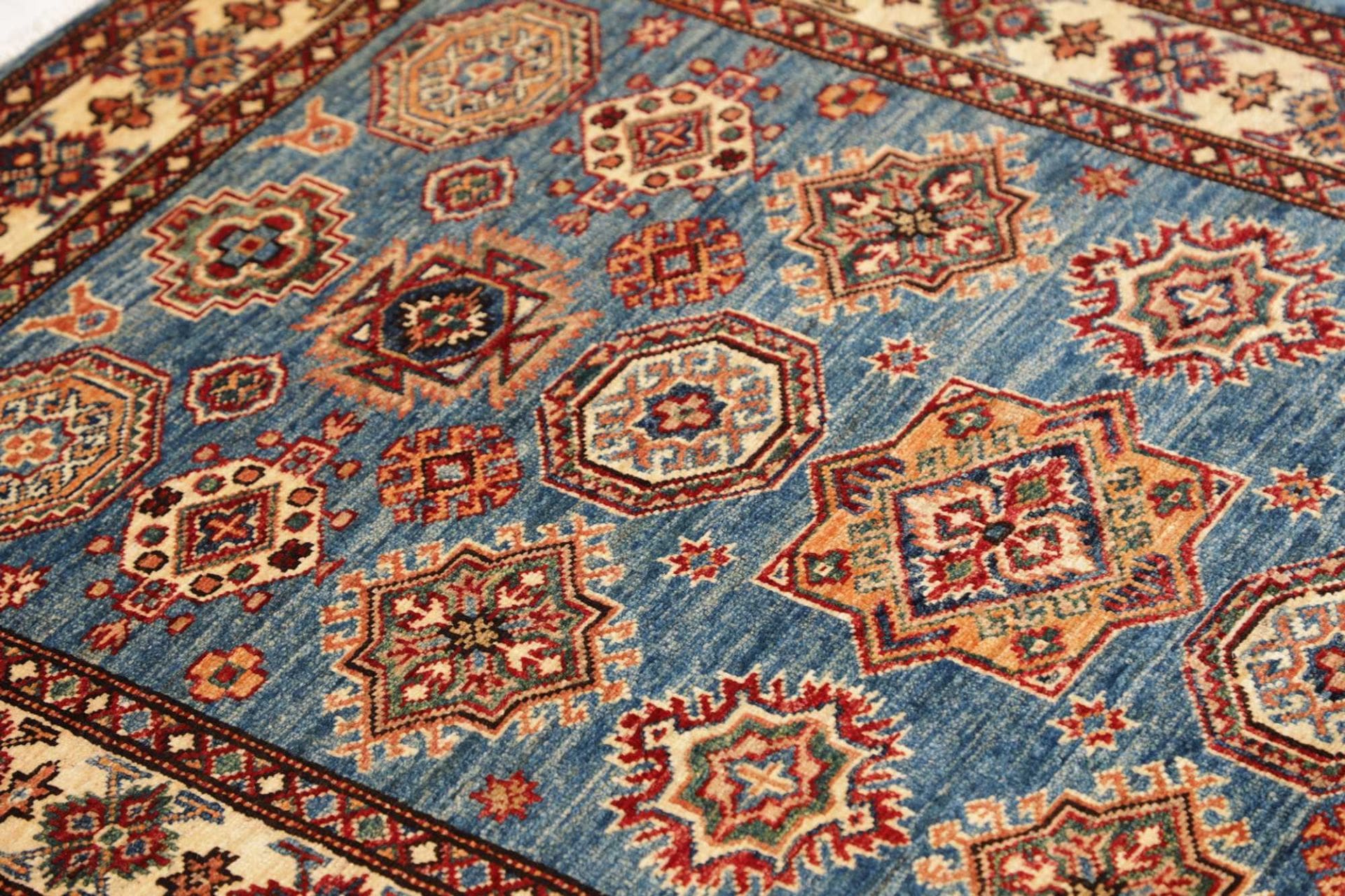 kazak-teppich-101-x-147-cm-geometrisches-muster-handgeknupft-6 Kazak Orientteppich 101 × 147 cm aus Wolle, handgeknüpft