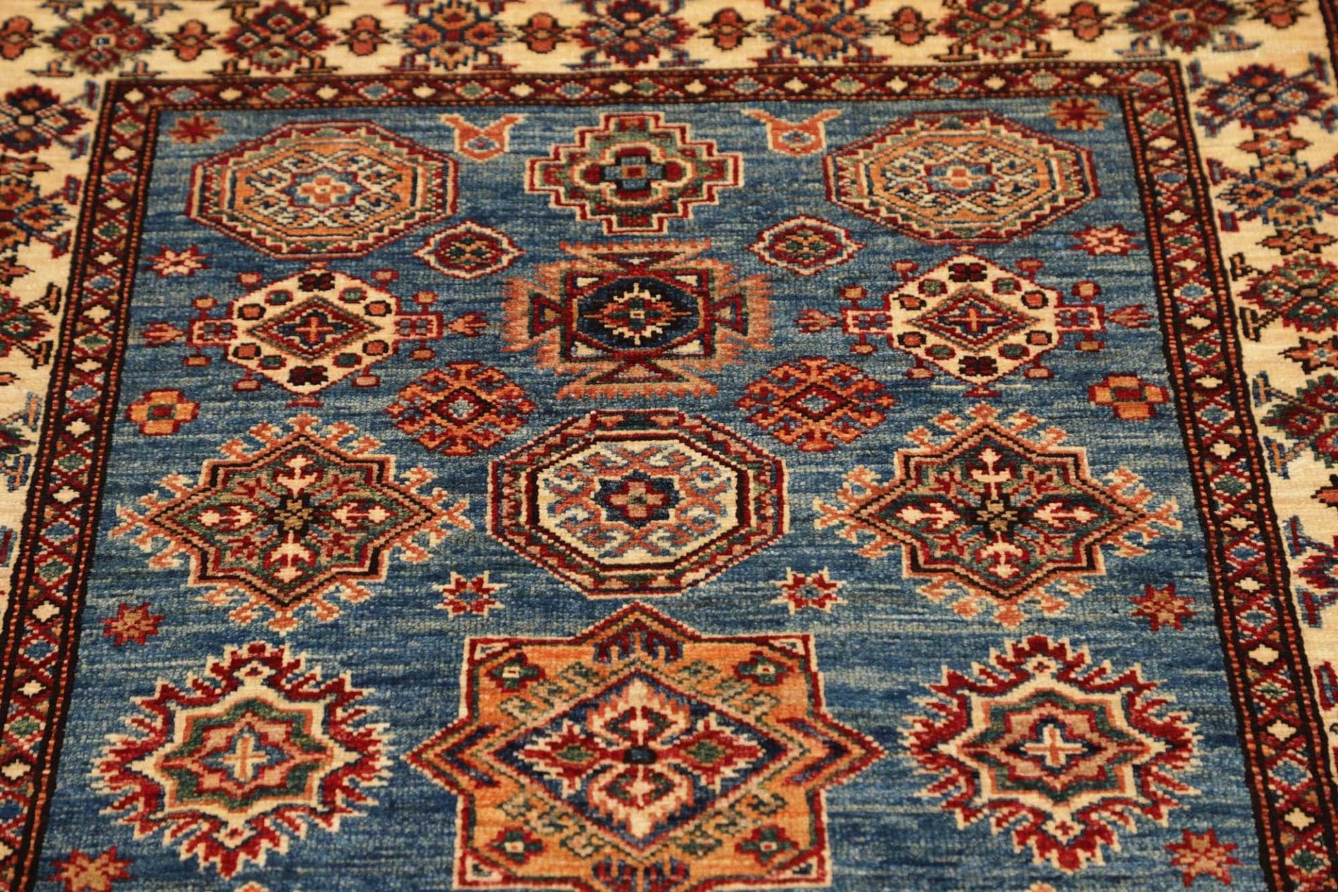 kazak-teppich-101-x-147-cm-geometrisches-muster-handgeknupft-7 Kazak Orientteppich 101 × 147 cm aus Wolle, handgeknüpft