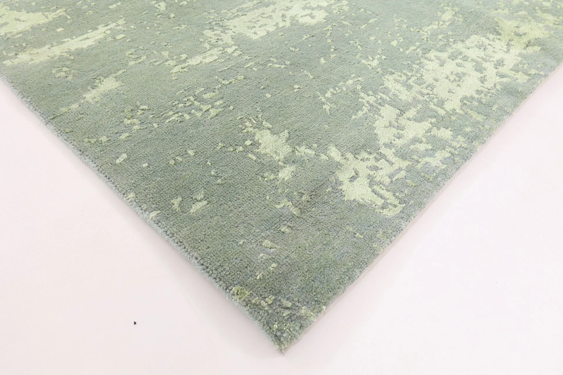 Orientteppich 167 × 241 cm aus Wolle & Seide, handgeknüpft