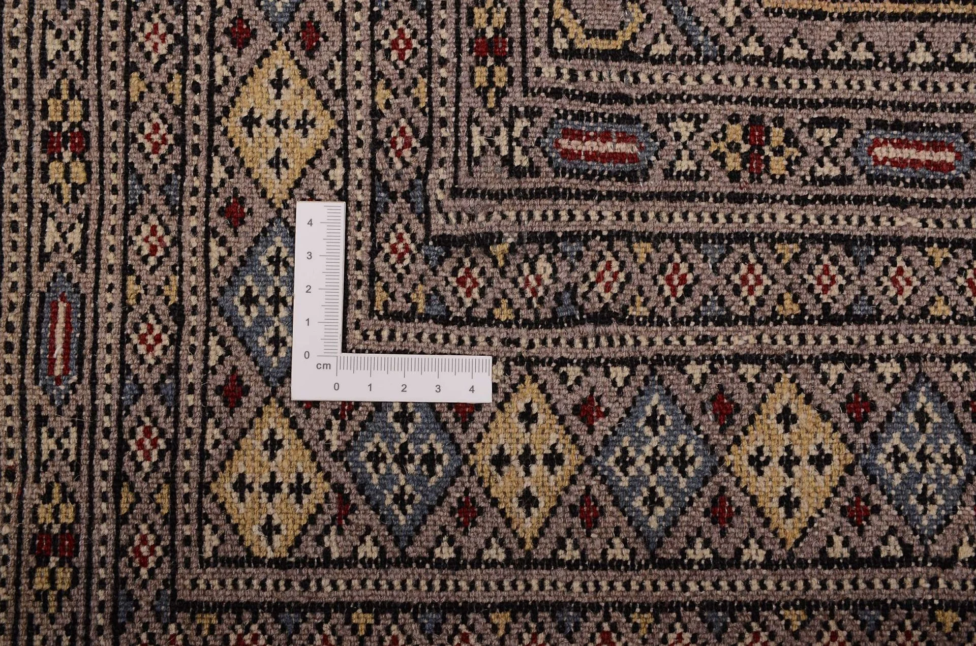 Orientteppich 121 × 187 cm aus Wolle, handgeknüpft